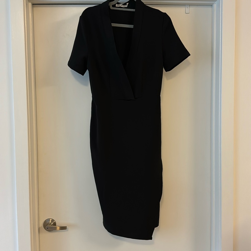 Black knee length wrap dress